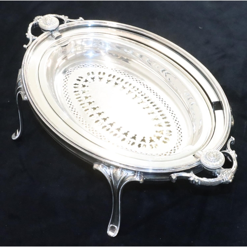 127 - A silver plated oval 2-handled breakfast dish with swivel top enclosing liner, on 4 splayed legs, 33... 