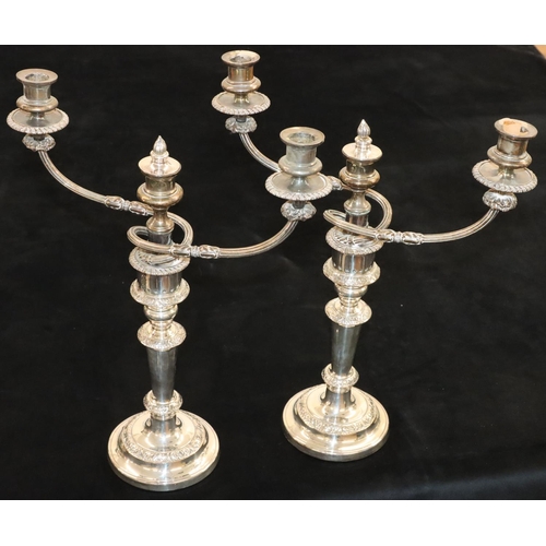 129 - A pair of 19th Century Sheffield plated 3-light 2-branch candelabras with reeded scroll arms, turned... 