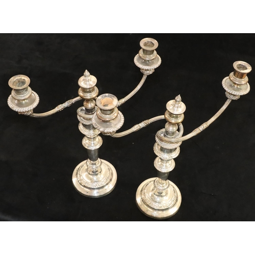 129 - A pair of 19th Century Sheffield plated 3-light 2-branch candelabras with reeded scroll arms, turned... 