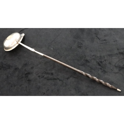 138 - A Georgian silver coloured metal toddy ladle set with 18th Century silver coin with twist bone handl... 