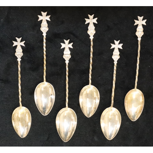 141 - A set of silver coloured metal teaspoons with Maltese Cross finials and twist stems, 1.9oz