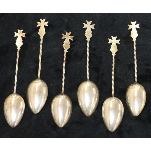 141 - A set of silver coloured metal teaspoons with Maltese Cross finials and twist stems, 1.9oz