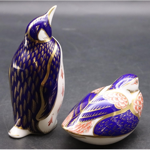 16 - 2 Royal Crown Derby paperweights in the form of a penguin and bird, on Imari pattern ground, tallest... 