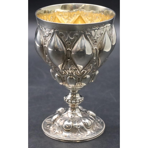 167 - A Victorian Gothic silver goblet with allover embossed decoration, on round sweeping base, London 18... 