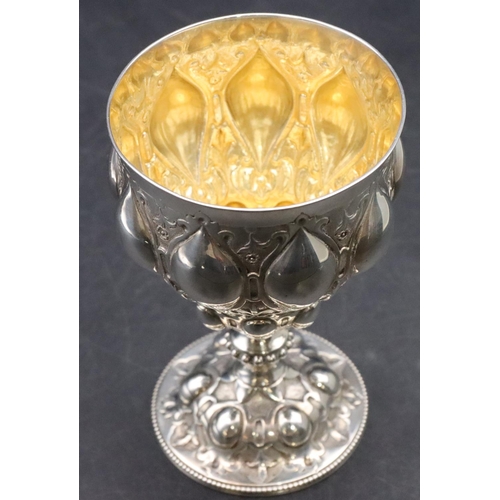 167 - A Victorian Gothic silver goblet with allover embossed decoration, on round sweeping base, London 18... 