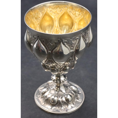 167 - A Victorian Gothic silver goblet with allover embossed decoration, on round sweeping base, London 18... 