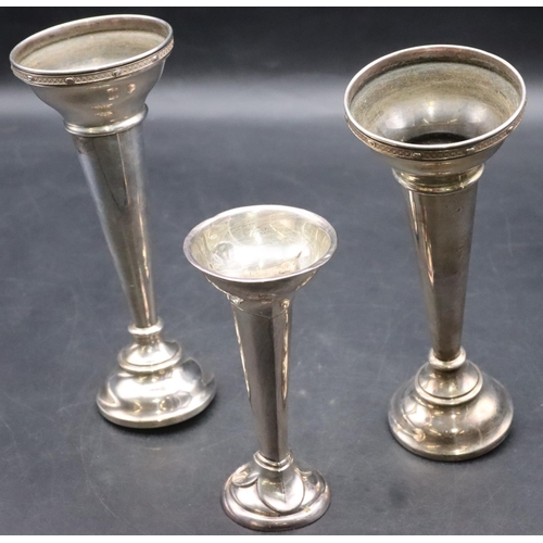 168 - A pair of London silver round trumpet shaped spill vases (weighted bases in need of restoration) and... 