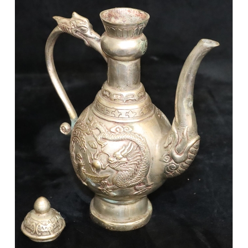 172 - A Tibetan silver plated round bulbous shaped coffee pot with raised dragon and phoenix decoration, 2... 