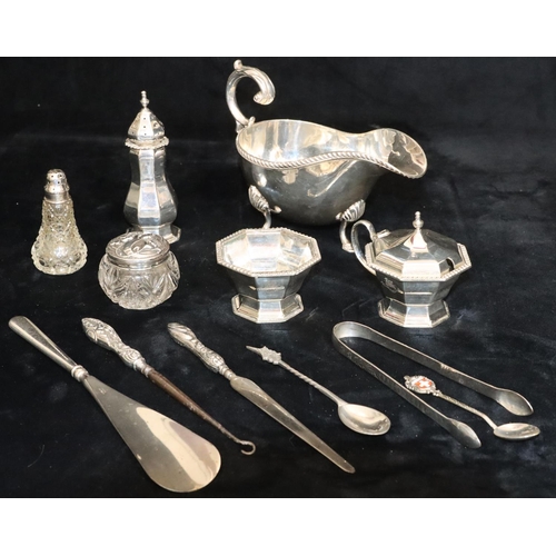 173 - A 3-piece silver plated condiment set with gadroon rim, a silver plated sauceboat and a small quanti... 