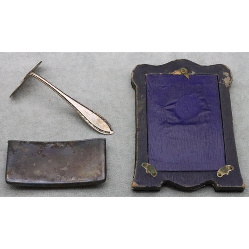 178 - A Birmingham silver concaved shaped card case with embossed floral, leaf and scroll decoration, a Bi... 