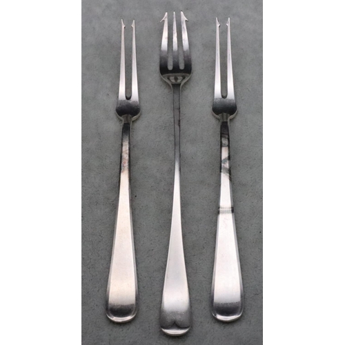 184 - A Sheffield silver pickle fork and a pair of 800 silver coloured metal pickle forks, 2.6oz gross (3)