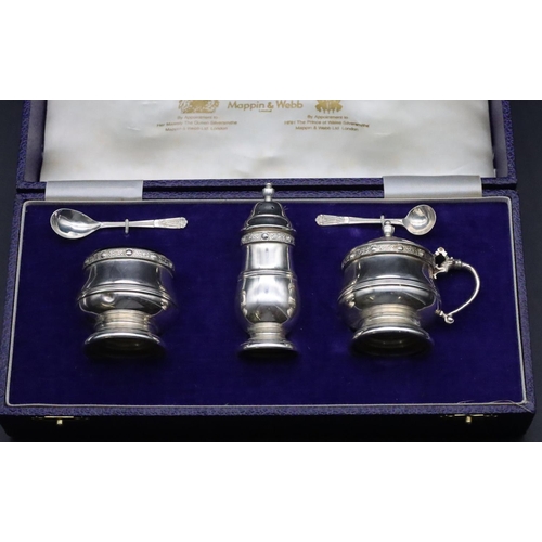 185 - A Mappin & Webb Birmingham silver 3-piece round bulbous shaped condiment set, comprising of lidded m... 