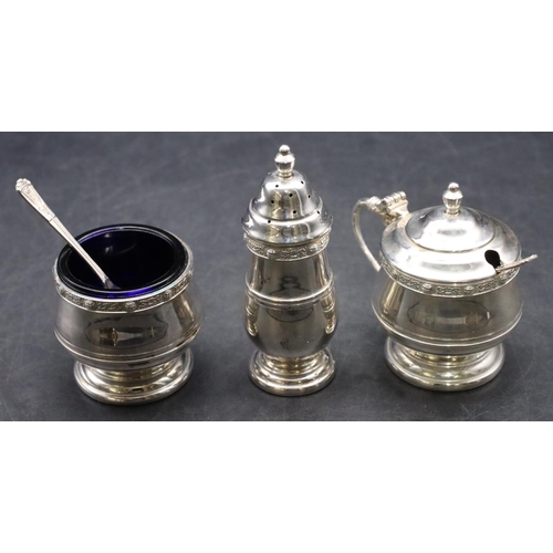 185 - A Mappin & Webb Birmingham silver 3-piece round bulbous shaped condiment set, comprising of lidded m... 