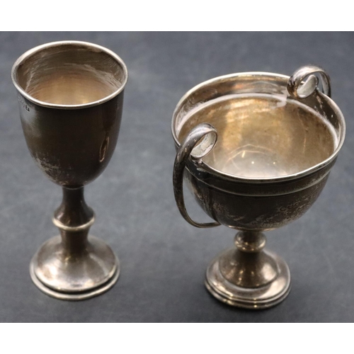 186 - A small Birmingham silver 2-handled trophy and a Chester small trophy, largest 9cm high, 2.6oz (2)