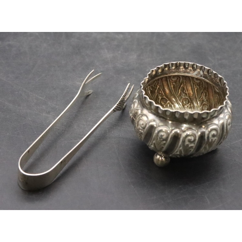 187 - A small Sheffield silver round bulbous shaped salt with crinkled rim and embossed scroll decoration,... 