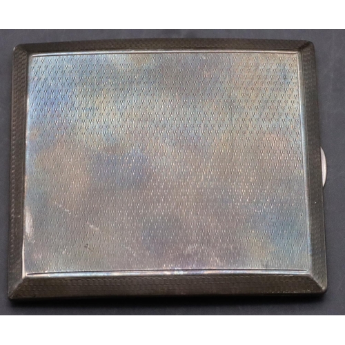 188 - A Birmingham silver concave shaped cigarette case with allover engine turned decoration and hinged f... 