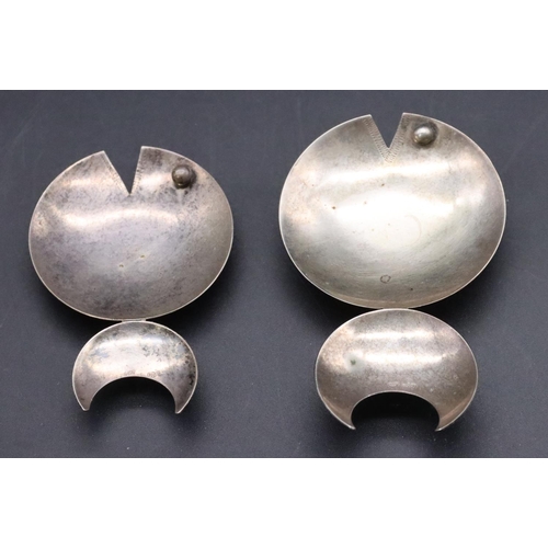 210 - A pair of novelty 800 silver coloured metal small graduated dishes in the form of fish, largest 9cm ... 