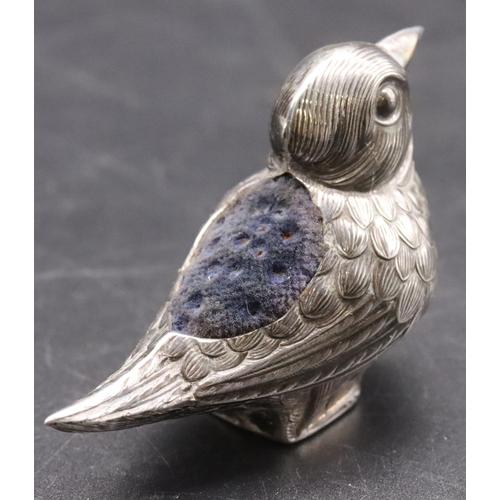 211 - A novelty 925 silver pin cushion in the form of a bird, 7.2cm long, 0.68oz gross