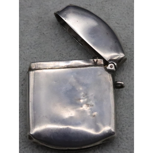 215 - A plain Birmingham silver vesta case inscribed 