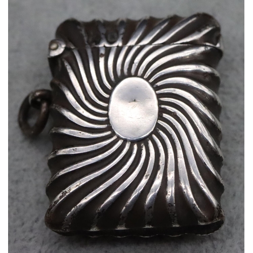 216 - A Sheffield silver vesta case with embossed swirl decoration, hinged lid, maker William Neale, 4.4cm... 