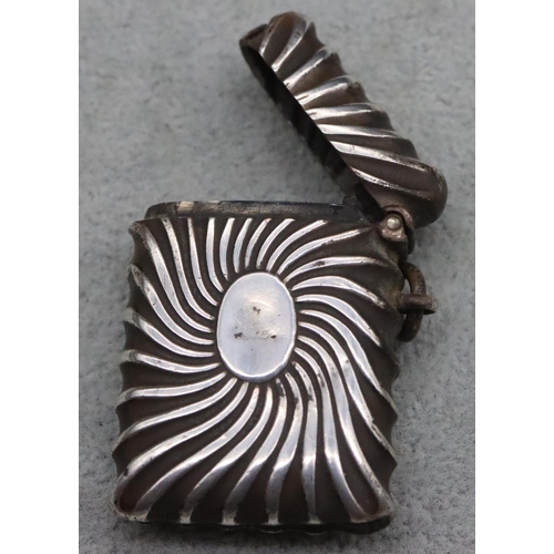 216 - A Sheffield silver vesta case with embossed swirl decoration, hinged lid, maker William Neale, 4.4cm... 