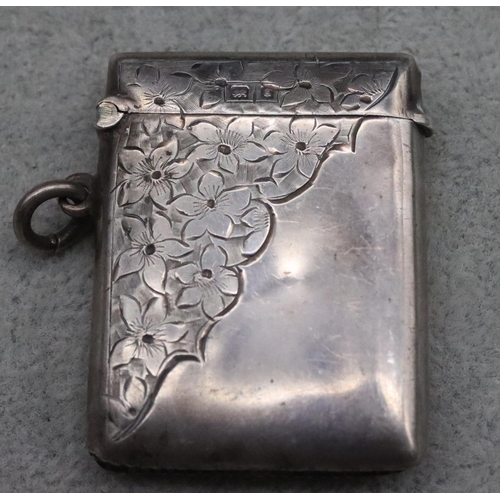 217 - A rectangular Birmingham silver vesta case with part bright cut floral decoration, maker's mark S & ... 