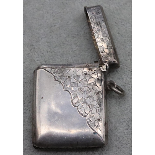 217 - A rectangular Birmingham silver vesta case with part bright cut floral decoration, maker's mark S & ... 