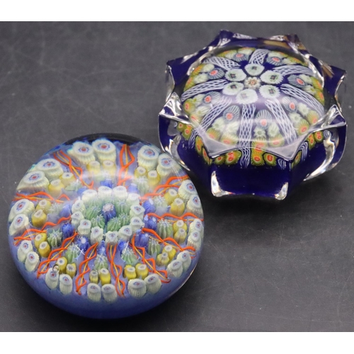 22 - A Strathearn millefiori round scallop shaped paperweight and another round bulbous shaped millefiori... 