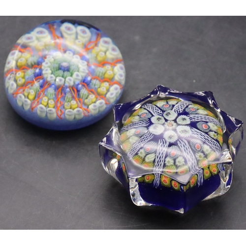 22 - A Strathearn millefiori round scallop shaped paperweight and another round bulbous shaped millefiori... 