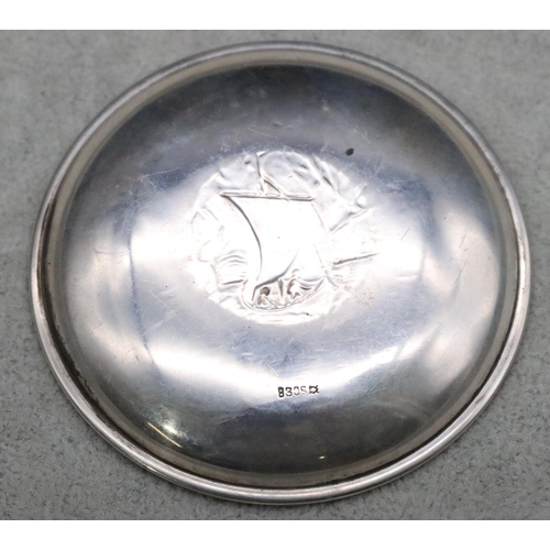 224 - An 830 Scandinavian silver coloured metal small round dish with embossed sailing boat motif, 7.2cm d... 