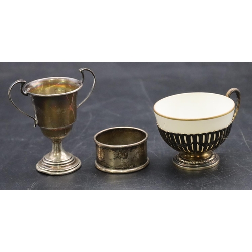 230 - An 800 silver gilt cup holder with white china bowl and pierced and raised swag decoration,  a small... 