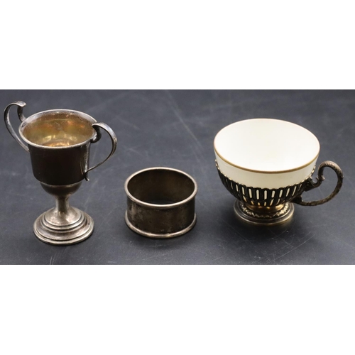 230 - An 800 silver gilt cup holder with white china bowl and pierced and raised swag decoration,  a small... 