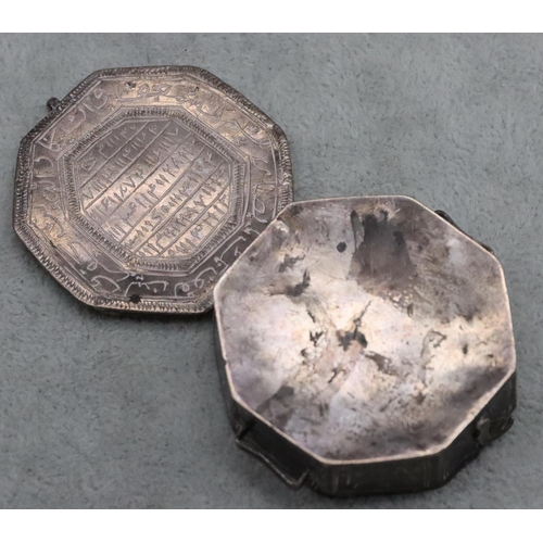 231 - A small Eastern octagonal shaped 2-handled snuff box with allover engraved decoration and hinged lid... 