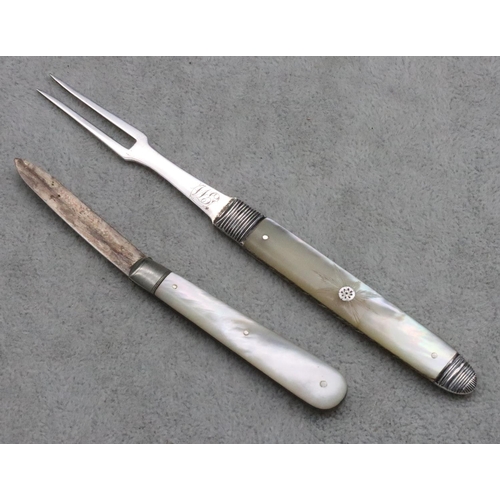 232 - A Georgian silver and Mother of Pearl folding penknife fork and another Birmingham silver and Mother... 