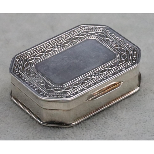 234 - A 925 silver rectangular shaped snuff box with hinged lid and part embossed scroll and studded decor... 