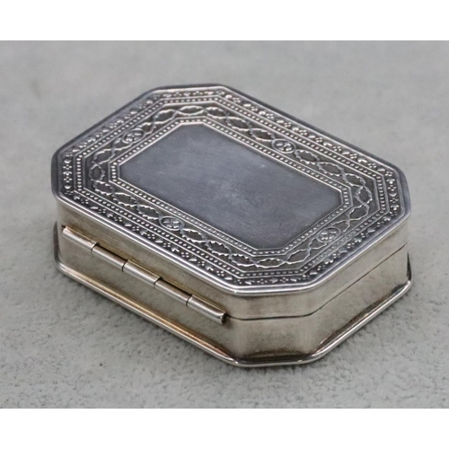 234 - A 925 silver rectangular shaped snuff box with hinged lid and part embossed scroll and studded decor... 