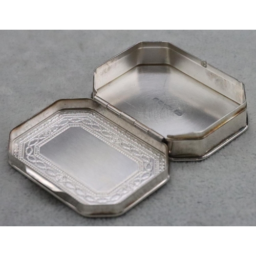 234 - A 925 silver rectangular shaped snuff box with hinged lid and part embossed scroll and studded decor... 