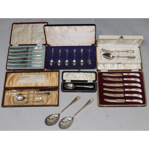 244 - A set of 6 Mother of Pearl handled butter knives in red leather case, a set of 6 porcelain handled b... 