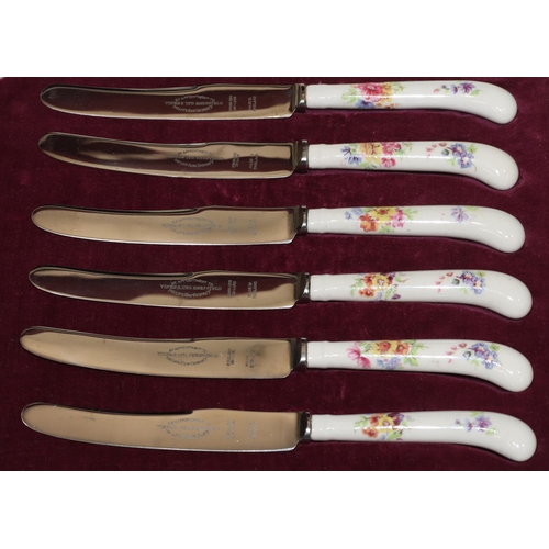 244 - A set of 6 Mother of Pearl handled butter knives in red leather case, a set of 6 porcelain handled b... 