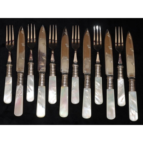 245 - A set of 6 silver plated fruit knives and forks with Mother of Pearl handles, in oak case