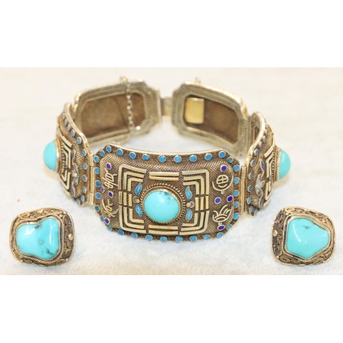 252 - An Oriental silver gilt 5-panel bracelet with turquoise centres  surrounded by turquoise and blue en... 