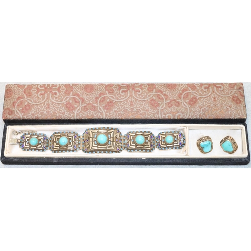 252 - An Oriental silver gilt 5-panel bracelet with turquoise centres  surrounded by turquoise and blue en... 