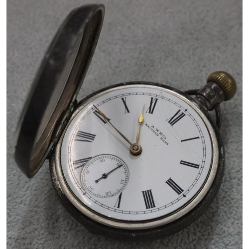 253 - An American Waltham Watch Co. silver open faced pocket watch with white enamel dial and seconds dial... 