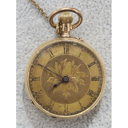 256 - A 14ct gold small fob watch with chased floral decoration and Roman numerals (starts but then stops)... 