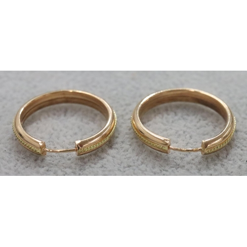 261 - A pair of gold circular earrings, 2.2 grams