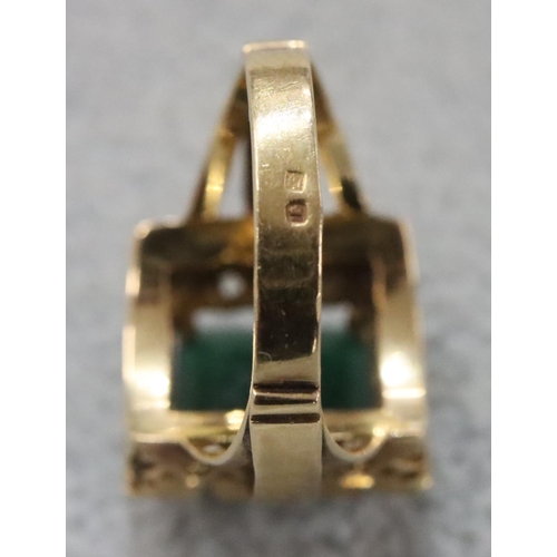 263 - A Continental gold rectangular shaped ring set with centre green stone surrounded by clear stones, S... 