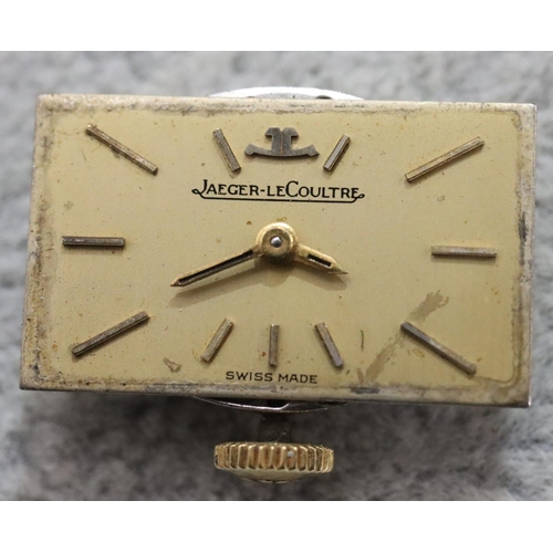 267 - An 18ct gold ladies' Jaeger Le Coultre wristwatch with rectangular shaped dial and open shoulders, l... 