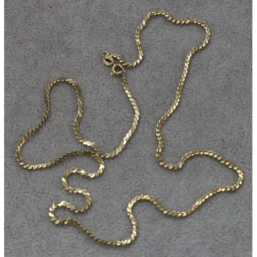 272 - An 18ct gold flat linked chain, 56cm long, 8 grams