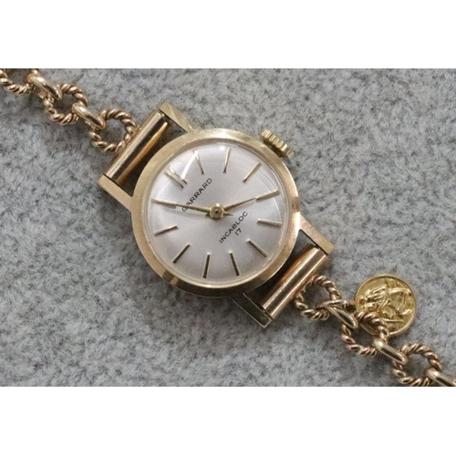 274 - A 9ct gold Garrard ladies' circular wristwatch with matching 9ct gold strap bracelet, 11.3 grams gro... 