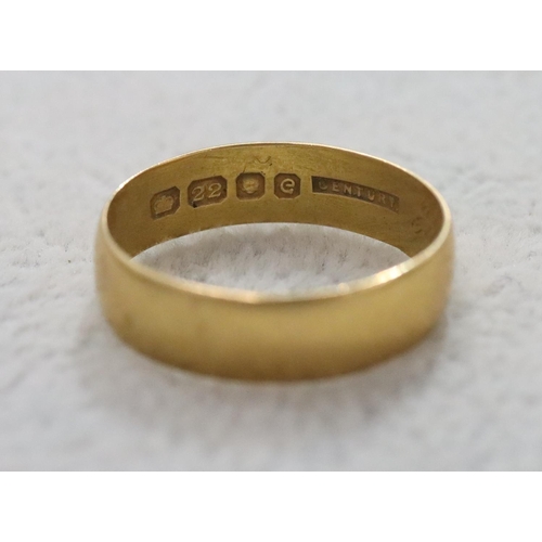 285 - A 22ct gold wedding ring, Size Q/R, 3.6 grams